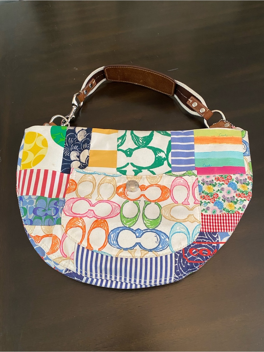 Coach Patchwork Printed Canvas Half-Moon Bag — Multicolor double hang tags.